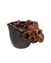 Rust Octopus on Black Cup