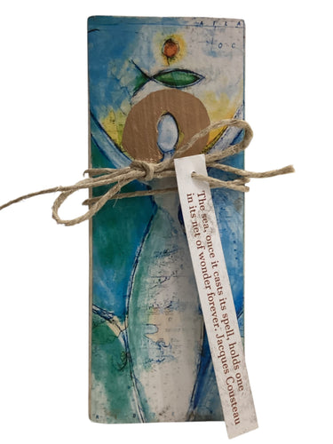 Small Wood Block Angel - The sea, once it casts its spell, holds one in its net of wonder forever. Jacques Cousteau