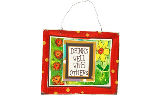 DRINKS WELL WITH OTHERS - Cardboard Plaque